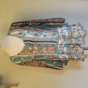 Umgee ruffled blouse. Semi sheer.